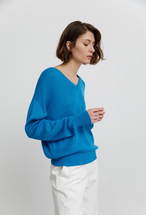 Tommy dark blue
knit sweater