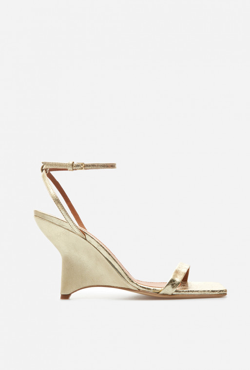 Isa gold leather
sandals